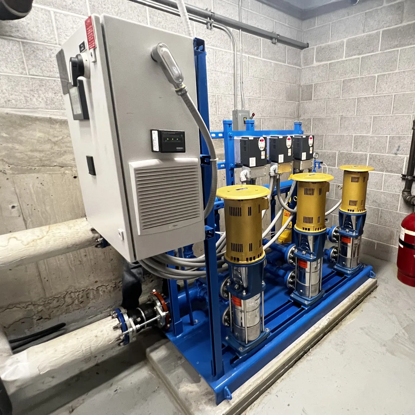 Booster pump package with pumps and controls