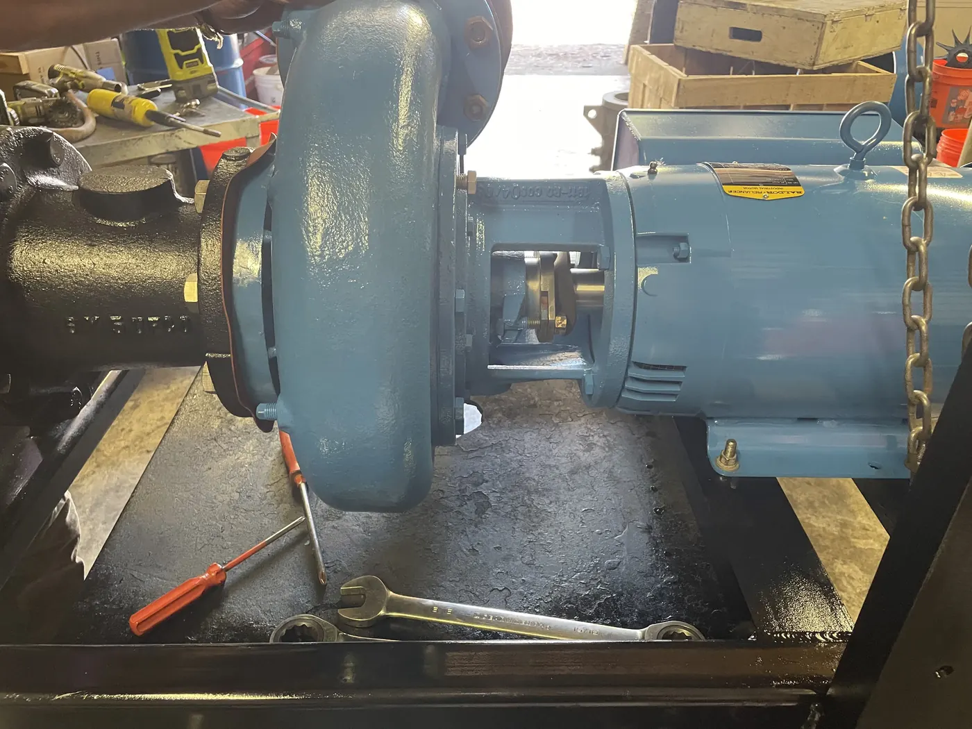 Pump and motor assembly in a service shop