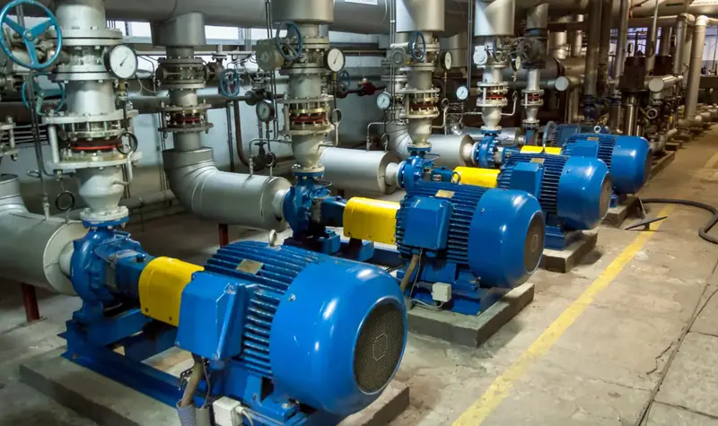 Row of industrial centrifugal pumps and electric motors