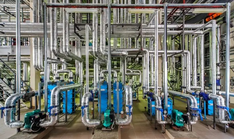 Process pump station with multiple discharge headers and connected piping